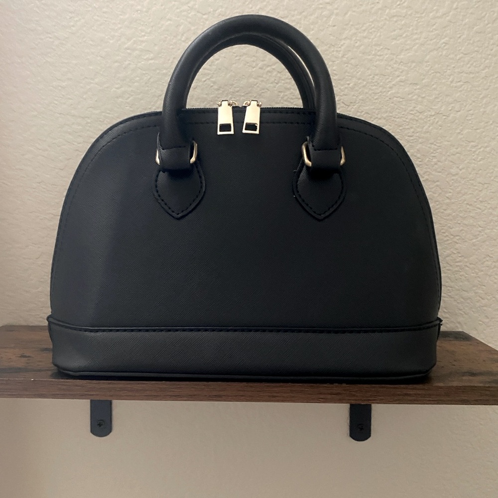 Vintage 70s Designer black hand bag